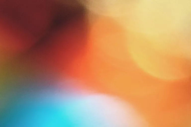 Symbolbild Eurythmie – ineinanderfließende farbige Lichter
